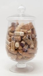 Lidded Glass Candy Jar Filled With Wine Corks.