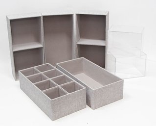 Grey Fabric Organizers And Acrylic Display Boxes