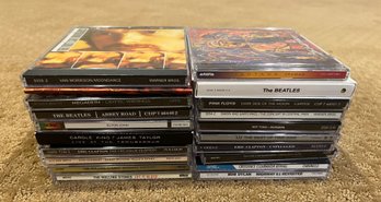 CD Lot Includes The Beatles, Santana And Pink Flyod