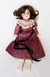 Early 20th Century Floradora Bisque Ball Jointed Doll Wearing A Plum Dress 20'
