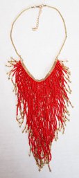 Coral Seed Bead Bib Necklace In Gold Tone