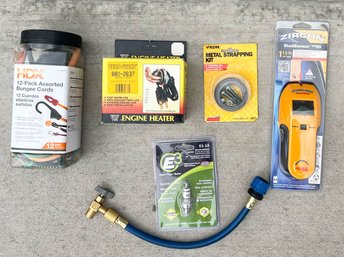 Engine Heater, Metal Strapping Kit, Zircon Stud Sensor, E3 Spark Plug And Assorted Bungee Cords New In Package