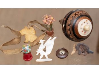 Miniatures Including Metal Gumball Machine, Wooden Spinning Top, Compass, Pins And Floral Centerpiece