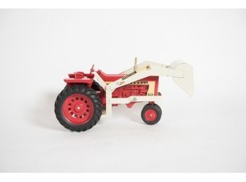 1960s CNH America LLC Farmall 806 Tractor With Loader 1/16 Scale