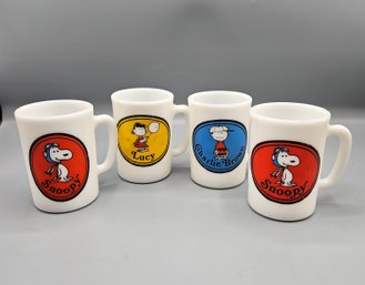 Four Vintage Peanuts Avon Mugs