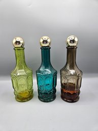 Three Vintage Avon Bath Products Bottles