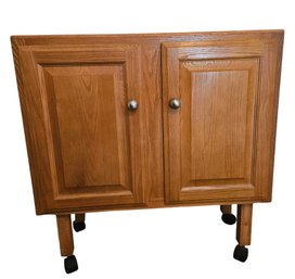 Wheeled Oak Cabinet With Tile Top