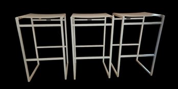 Three Potterybarn White Leather Backless Barstools