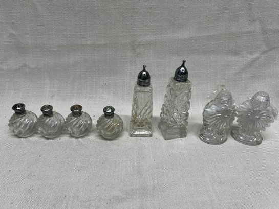 394) Assorted Salt And Pepper Shakers Clear Glass