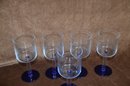 (#39) Set Of 5 Blue Stem Base Drinking Glasses 7'H
