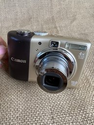 (#130) Vintage Canon Digital Camera Power Shot A1000 IS 10.0 Mega Pixel PC1309 With Case 4X Optical Zoom