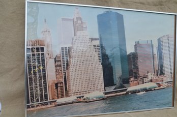 (#61) Metal Framed Picture Of Skyscraper ( Water Damage On Side)