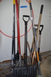 (#65) Assorted Lot Of Garden Tools Pitchfork, Rack, Snow Shovel, Broom