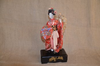 33) Japanese Geisha Doll On Black Lacquer Music Box ( Works ) 12'H