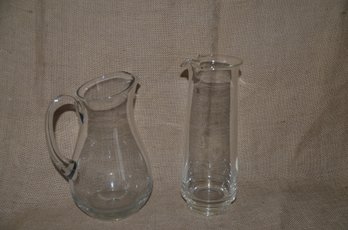 87) Clear Glass 9.5'H And 8.5'H Pitcher Set Of 2