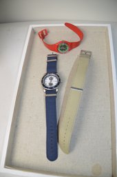(#509) Nautica Watch ( Works) Extra Beige Band ~ Vintage Swatch Quartz Swiss Red Plastic Band ( Works)