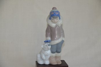 25) Llardo Eskimo Boy With Polar Bear Cub Porcelain Figurine Appox. 6'H On Wood Stand