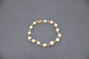 145) 14K Gold And Pearls Bracelet 7.5'