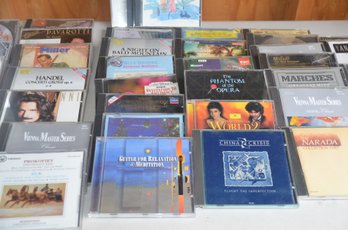 (#103) Assorted Music CD's ( In Red Bag)