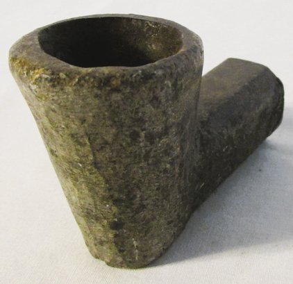 A Carved Native Stone Pipe Bowl And A Bird Point Arrowhead