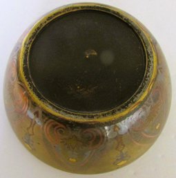 A Small Leather Bodied Bowl With Ornate Brass Overlay