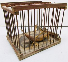A Carved Japanese Cricket In A Cage