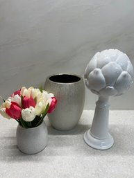 Artificial Flowers, Silver Vase, And Tabletop Decor