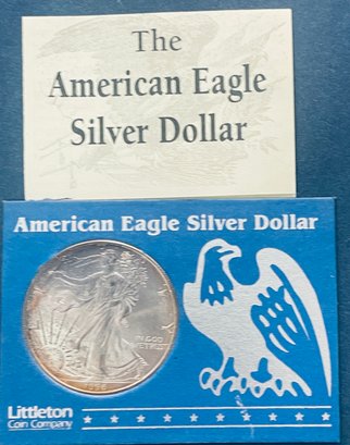 1996 US SILVER AMERICAN EAGLE - 1 0ZT 99.9 FINE SILVER DOLLAR COIN IN LITTLETON COIN CO. DISPLAY CASE-TONED