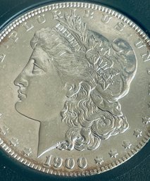 1900 MORGAN SILVER DOLLAR COIN - IN PLASTIC CASE