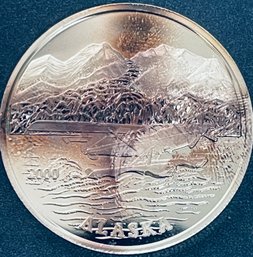 ALASKA MINT 1 OZT.  99.9 PERCENT FINE SILVER ROUND-THE SEAL OF THE STATE OF ALASKA - TONED!