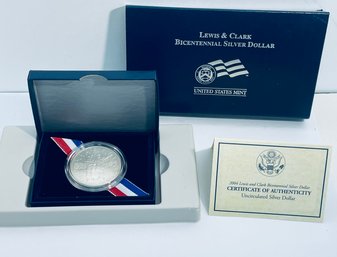 2004 P LEWIS AND CLARK COMMEMORATIVE SILVER UNCIRCULATED DOLLAR W/ BOX AND COA
