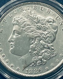 1886 MORGAN SILVER DOLLAR COIN - BU / BRILLIANT UNCIRCULATED!  IN PLASTIC CAPSULE
