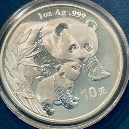 COLLECTIBLE BULLION-2004 SILVER PANDA 10 YUAN COIN-1 TROY OUNCE .999 FINE SILVER-IN CAPSULE