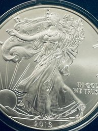2019 SILVER AMERICAN EAGLE ONE OZT 99.9 PERCENT FINE SILVER ROUND COIN IN PLASTIC CAPSULE
