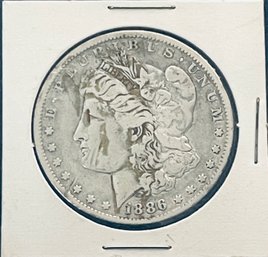 1886-O MORGAN SILVER DOLLAR COIN IN FLIP