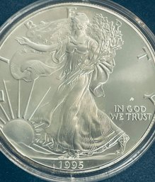 1995 SILVER AMERICAN EAGLE ONE OZT 99.9 PERCENT FINE SILVER ROUND COIN IN PLASTIC CAPSULE