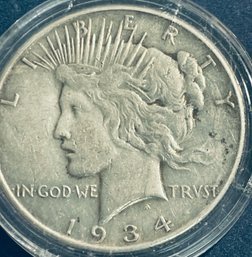1934-D PEACE SILVER DOLLAR COIN- IN PLASTIC CAPSULE