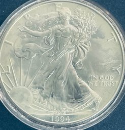 1994 SILVER AMERICAN EAGLE ONE OZT 99.9 PERCENT FINE SILVER ROUND COIN IN PLASTIC CAPSULE