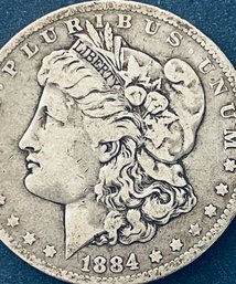 1884-O MORGAN SILVER DOLLAR COIN