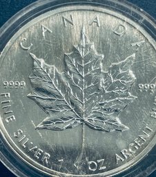 1989 1 OZT. .9999 FINE SILVER CANADA MAPLE LEAF 5 DOLLAR ROUND COIN -  IN PLASTIC CAPSULE