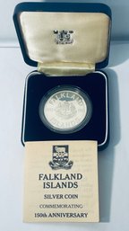 ROYAL MINT FALKLAND ISLANDS STERLING SILVER COIN COMMEMORATING 150TH ANNIVERSARY IN BOX