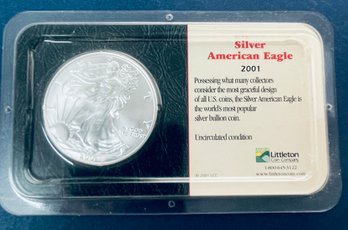 2001 SILVER AMERICAN EAGLE - 1 OZT 99.9 FINE SILVER ROUND IN LITTLETON COIN CASE- SOME TONING