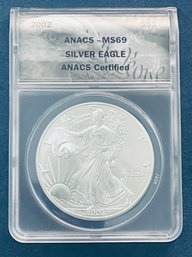 2002 SILVER AMERICAN EAGLE $1 99.9 FINE -  ANACS GRADED -MS69