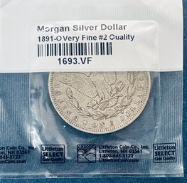 1891-O MORGAN SILVER DOLLAR COIN - IN LITTLETON COIN PLASTIC