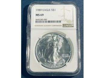 1989 SILVER AMERICAN EAGLE $1 99.9 PERCENT FINE SILVER ROUND - NGC GRADED -MS69