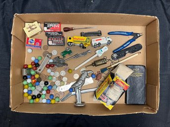 Lot Of Assorted Items Including Marbles, English Coins, Matches, Medico Filters, Toy Cars, Tools, And Planner