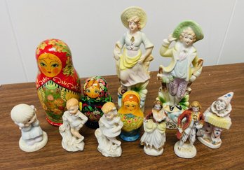 3 Nesting Dolls And Various Figurines