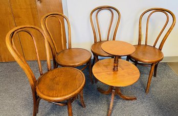 Four Vintage Wooden Chairs And Round Two Tiered Side Table