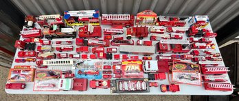 Huge Lot Of Assorted Firetruck Toys, Some Battery Operated And Working And Some In Packaging