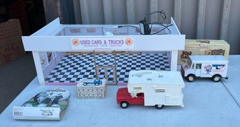 Vintage Toy Cars And Trucks, Golf Balls, And Custom Lighted Toy Car Garage